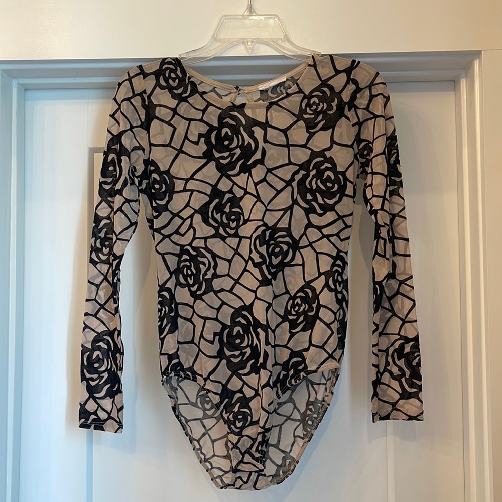 A’GACI sheer nude bodysuit with felt flower overlay